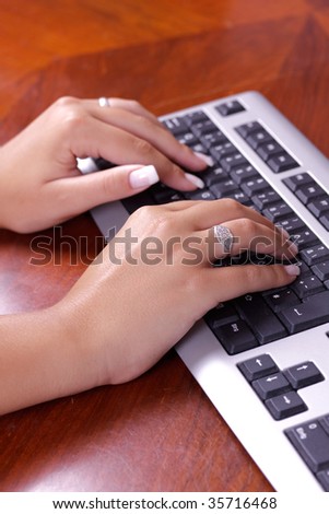 Human hands doing some computer work