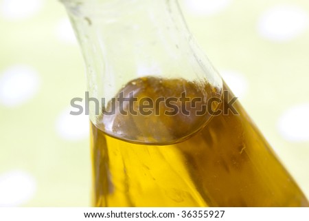 Bottle of vegetable oil or any yellow liquid