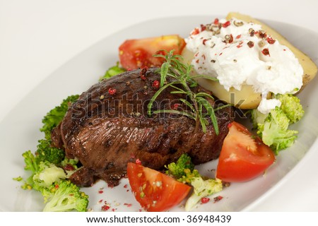 Steak dinner , Fillet Mignon- juicy grilled, pepper steak
