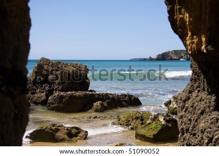 praia da rocha beach,portugal-algarve, looking through the window rock