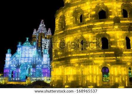 HARBIN, PEOPLE\'S REPUBLIC OF CHINA - DECEMBER 27: Ice Sculpture of the Coliseum at the 2014 Harbin Snow and Ice Festival shown on December 27, 2013 in Harbin, People\'s Republic of China.