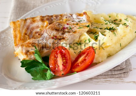 Pieces of cod fish and boiled potatoes
