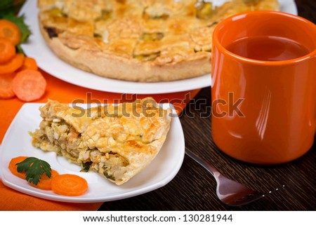 Carrot cake with a cup of tea