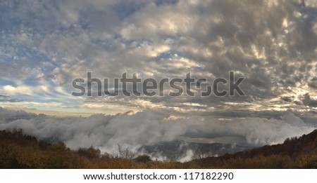 the lake of Varese under the clouds to the sunset