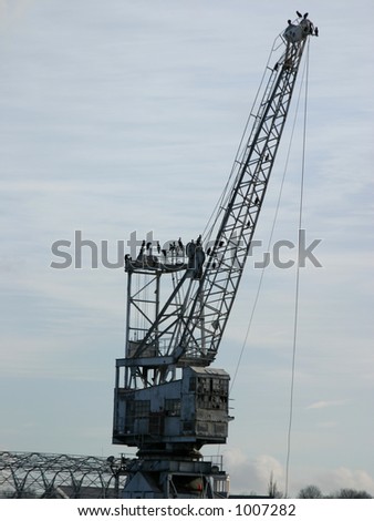 Heavy duty industrial crane against sky