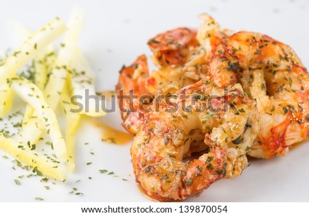 macro photograph of a prawn dish decorated with lemon