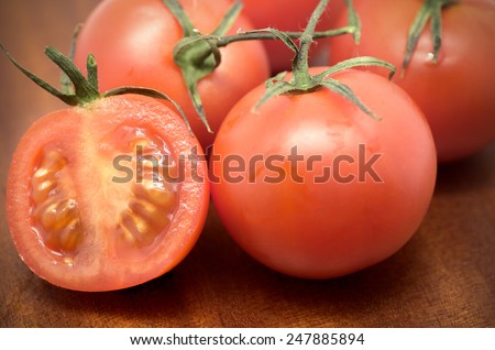 Product photography is newly harvested tomatoes on white background
