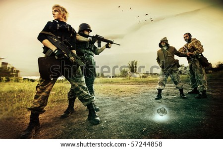 Military patrol in Chernobyl (man and blond woman) is stopping two stalkers on the road