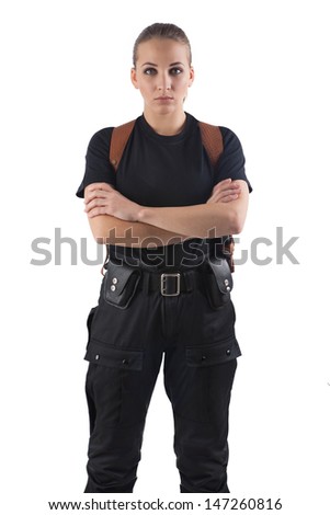Police officer woman is standing with folding arms. Isolated on white.