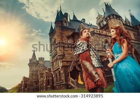 Beautiful princess is giving sword to her brave knight. Ancient castle on the background.