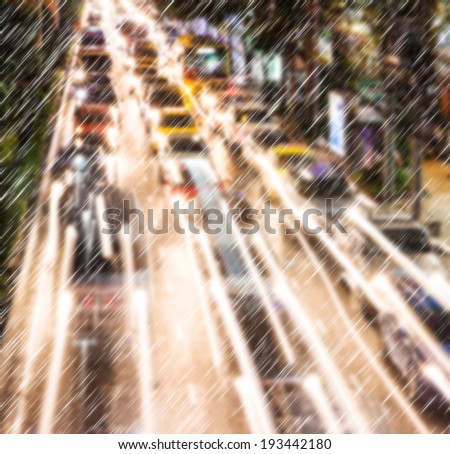 Light traffic on a rainy night. Motion blur.