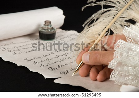 Handwriting a poem on old paper scroll. Text is from Shakespeare\'s Sonnet 18.