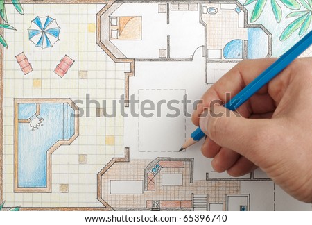 Interior designer draws house floor plan