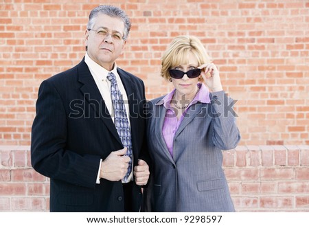 Executive man and Woman Look Confident