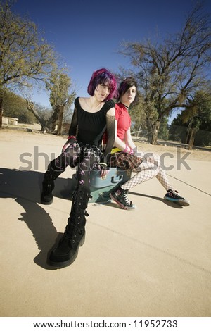 suitcases for girls. stock photo : Two Punk Girls