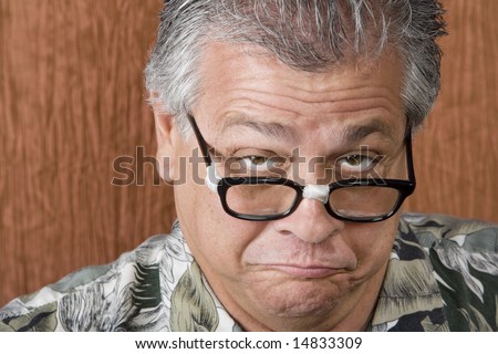 Silly Mexican-Italian Man with Taped Corrective Glasses