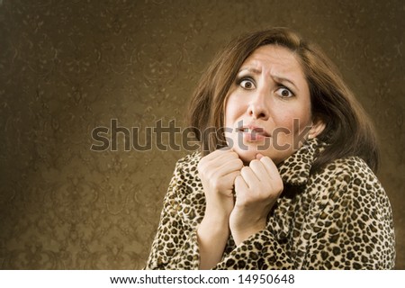 Frightened Hispanic Woman in Leopard Print Coat