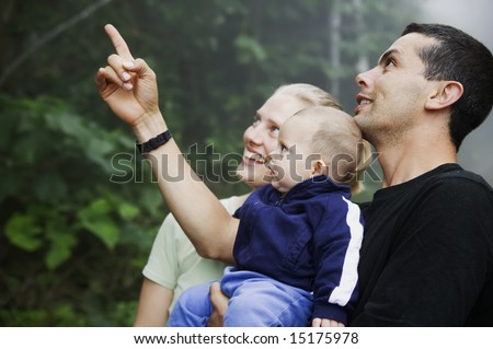 Mixed Hispanic Family with Cute Baby Boy Experiencing Nature in the Rain Forest