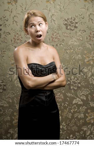 Pretty Ethnic Woman Making Funny Face in Front of Flowered background