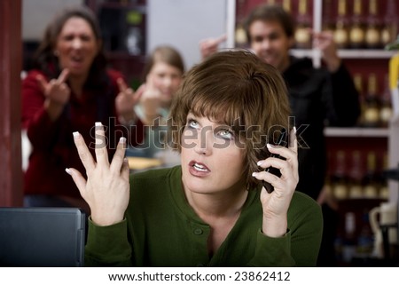 Annoying woman in a cafe on her cell phone gets the finger