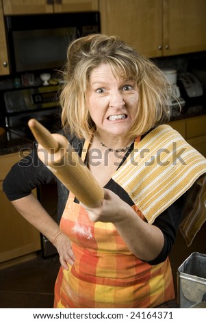Frustrated Woman Baker with Rolling Pin Covered in Flour