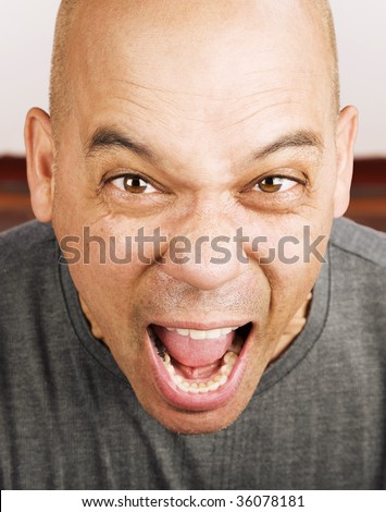 Close up shot of screaming man's face