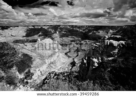 Light and shadow playing on texture of the Grand Canyon featuring Bright Angel Trail