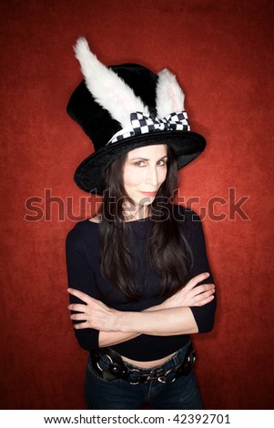 Woman in a big hat with rabbit ears