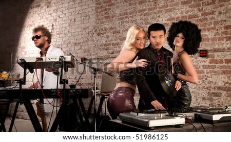 Mac Daddy DJ with Ladies at a 1970s Disco Music Party