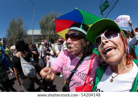 PHOENIX, AZ - MAY 29:  Women protesting during Arizona anti SB1070 march.  May 29, 2010 in Phoenix, AZ.