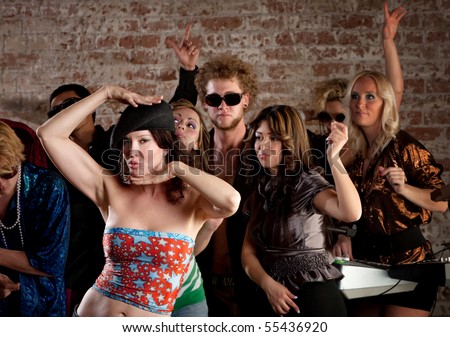 stock photo Dancing people at 1970s Disco Music Party