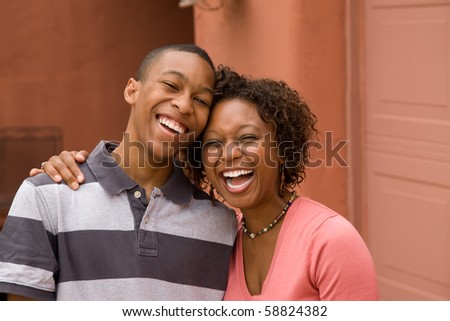 Happy Single-parent mom and son with copy space
