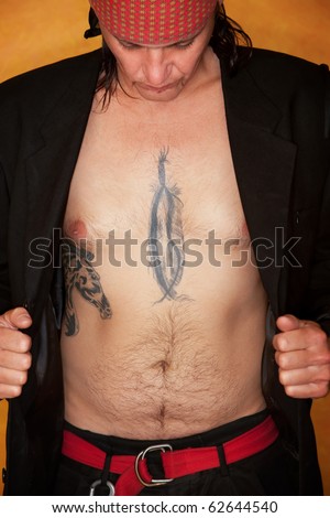 stock photo Handsome mixed race man with feather tattoo