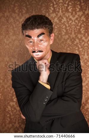 Businessman with plastic mask on damask background