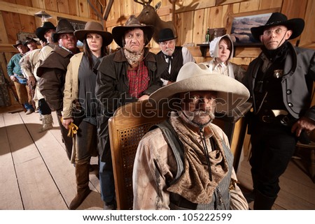 Serious customers in classic old American west saloon
