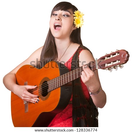 Young woman with cross eyes playing guitar and singing