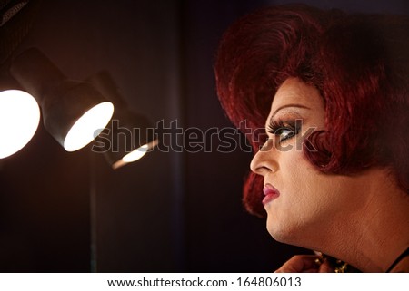 Big beautiful Caucasian drag queen with lights