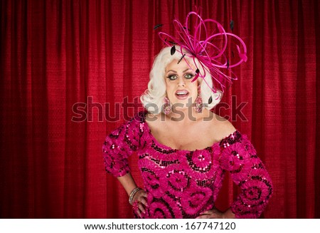 Blond drag queen with hands on hips
