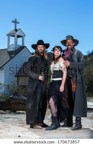 Old West Characters Pose Infront of Church