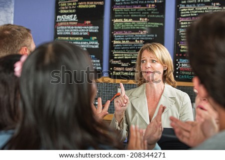 Impatient customers and stressed out cafe owner