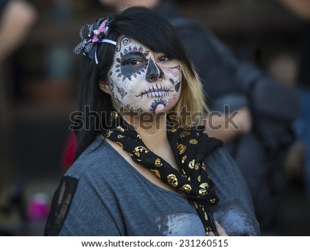 TUCSON, AZ/USA - NOVEMBER 09: Unidentified young woman in facepaint at the All Souls Procession on November 09, 2014 in Tucson, AZ, USA.