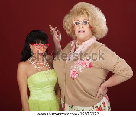 Excited woman with drag queen wearing thick eyeglasses
