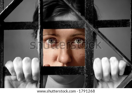 trapped woman behind iron bars