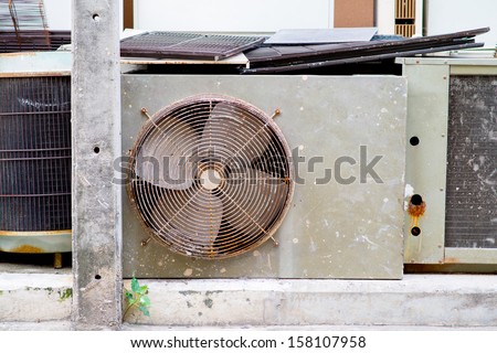 old rusted broken air conditioner fan