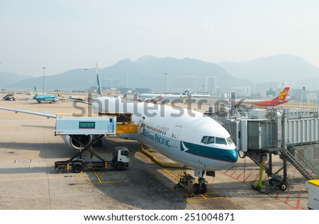 HONG KONG - FEBRUARY 07: Cathay Pacific Boeing 777-300ready for boarding in Hong Kong Airport on February 07, 2015. Cathey Pacific was founded in 1946 and became one of the famous airline in Hong Kong