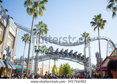 Osaka,Japan -NOV 1: Riders enjoy the Rip Ride Rockit Rollercoaster at Universal Studios Theme Park in Osaka, Japan on November 11, 2015. The theme park has many attractions based on the film industry.