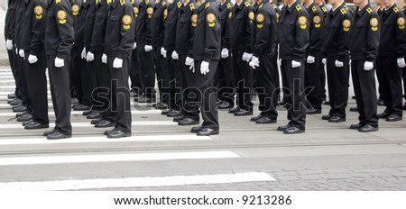 Soldiers marching in a parade.