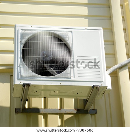 Landscape photo of an air conditioning unit.