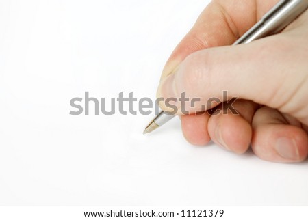 Hand holding pen isolated on white