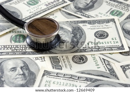 Stethoscope on money background of  dollars